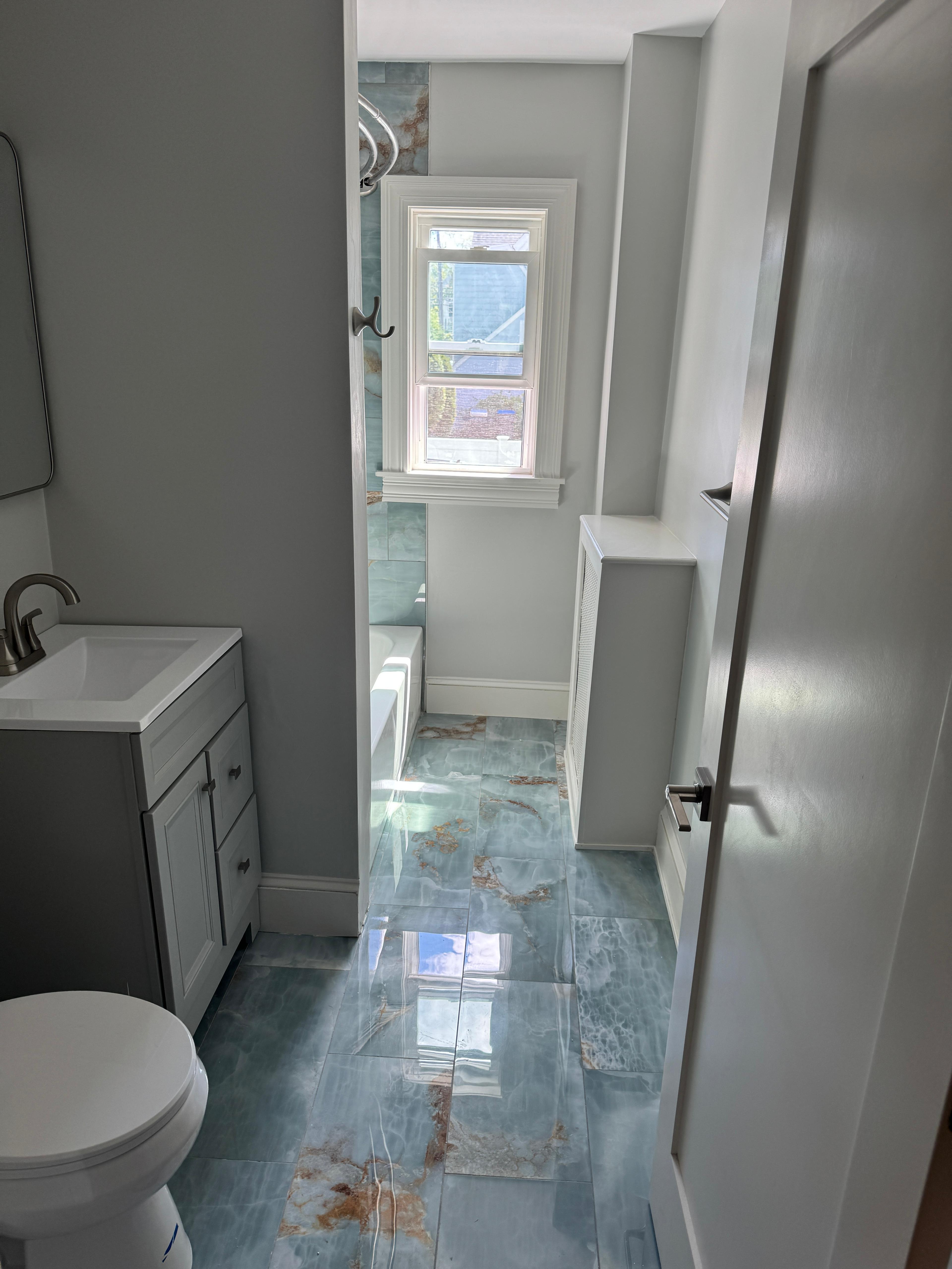 Waterproofed shower surround and tile finish, Watertown MA renovation