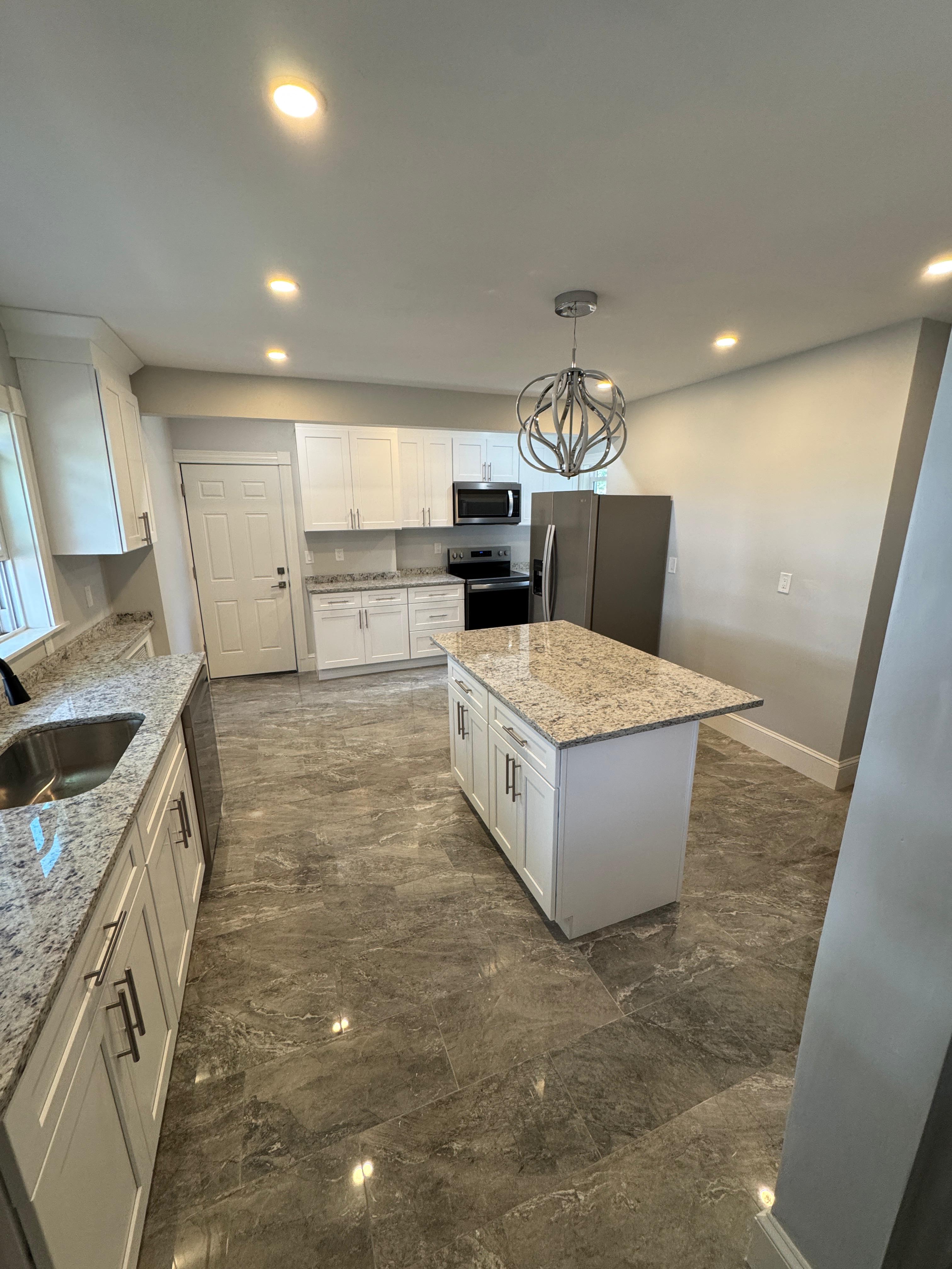 New kitchen cabinets and countertops — Dorchester Boston remodel by Elite Contractors