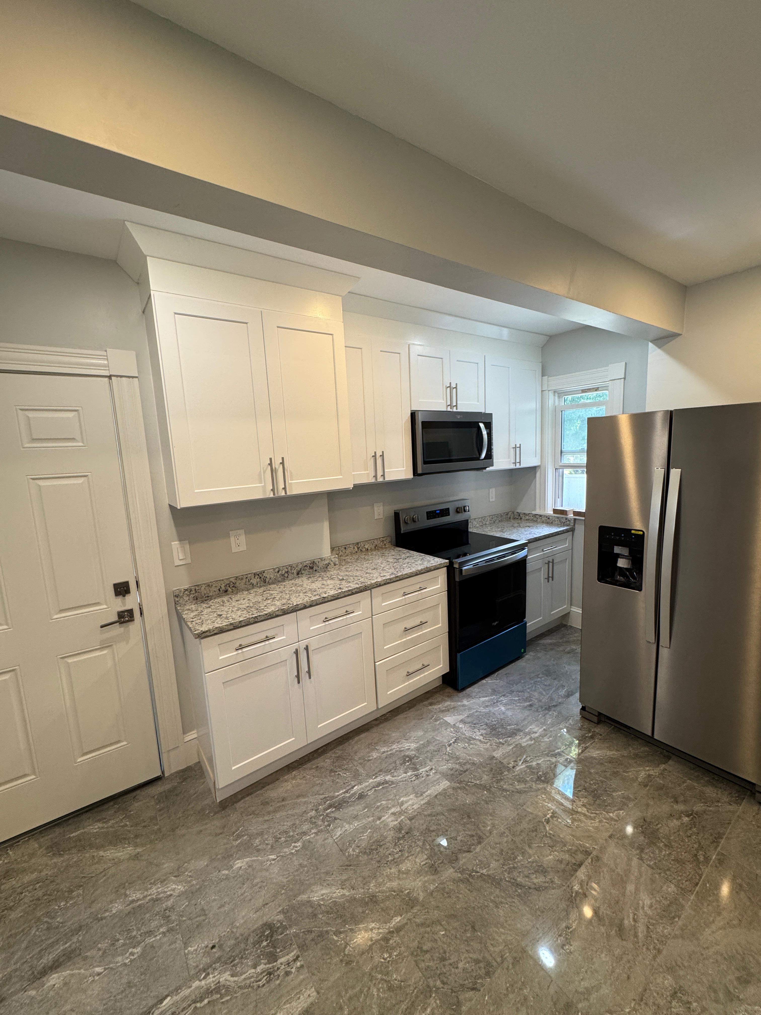 Completed kitchen remodel in Dorchester MA by Elite Contractors LLC