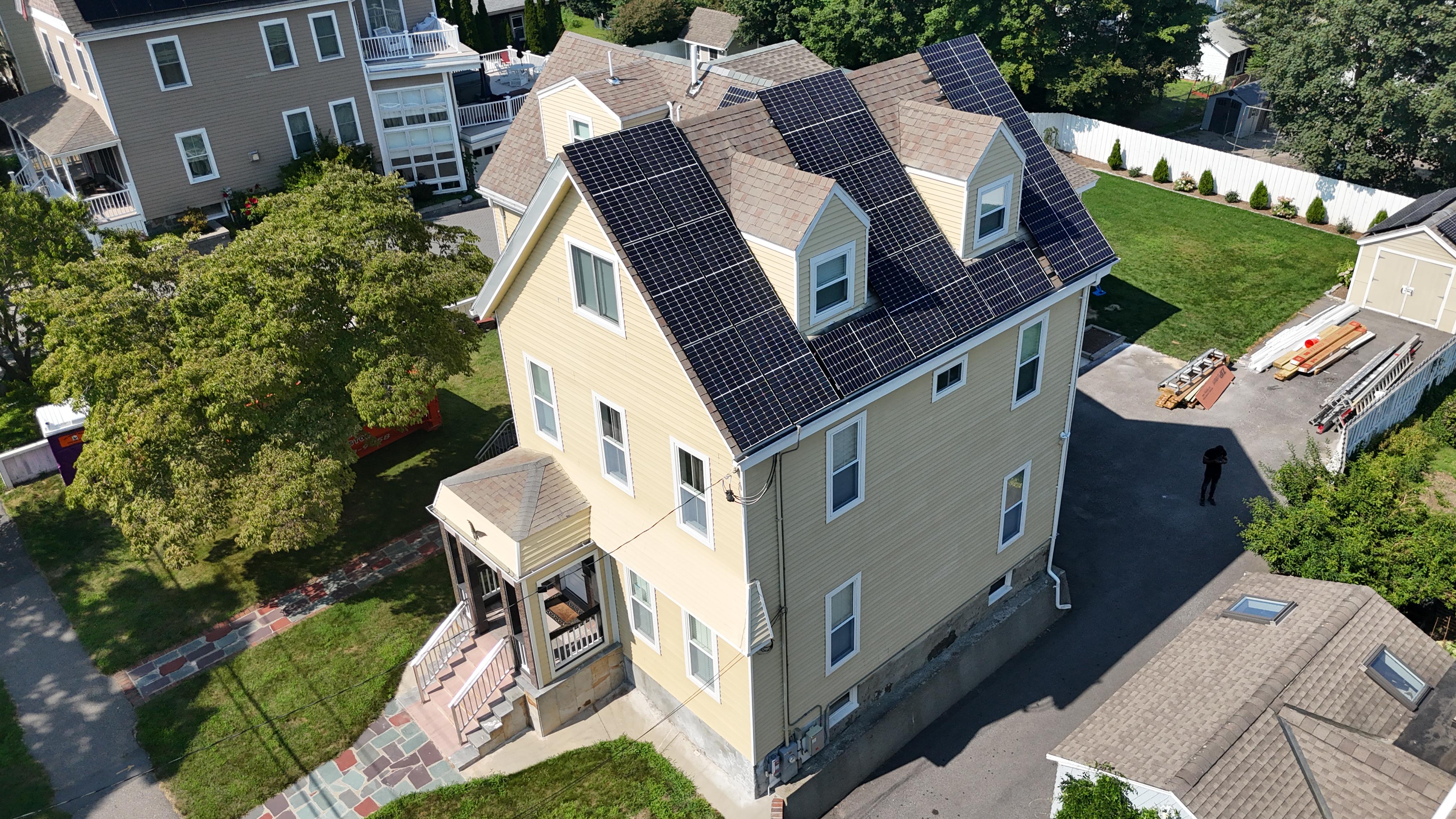 Exterior cladding and roofline tie-in — Highland MA room addition