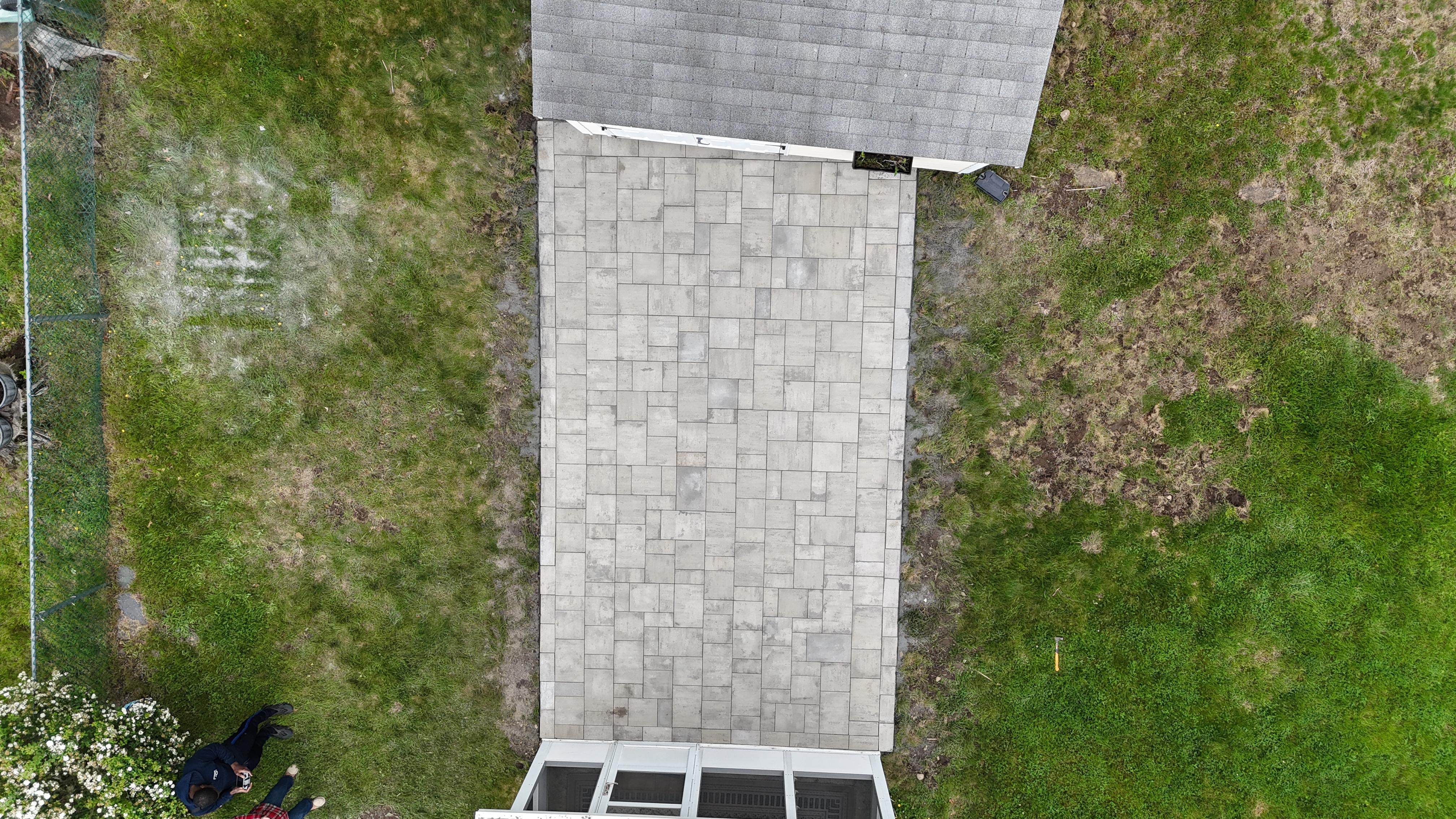 Asphalt installation in progress — Stoughton MA driveway by Elite Contractors